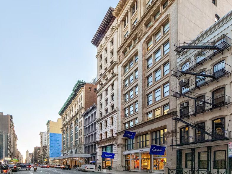 Ornate loft buildings lining Broadway on 625 Broadway's block